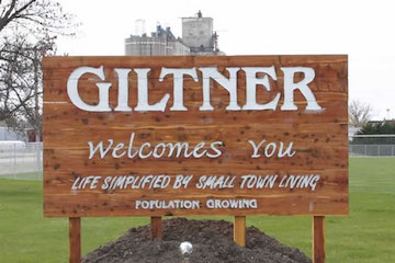 brown welcome to Giltner sign